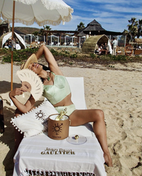 Model with our custom woven fan for Jean Paul Gaultier beach club