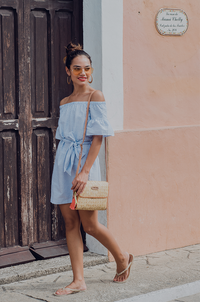 girl with a straw shoulder bag in Valladolid